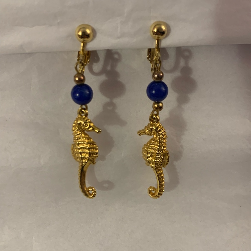 Gold Tone Seahorse Clip On Earrings with Blue Accent